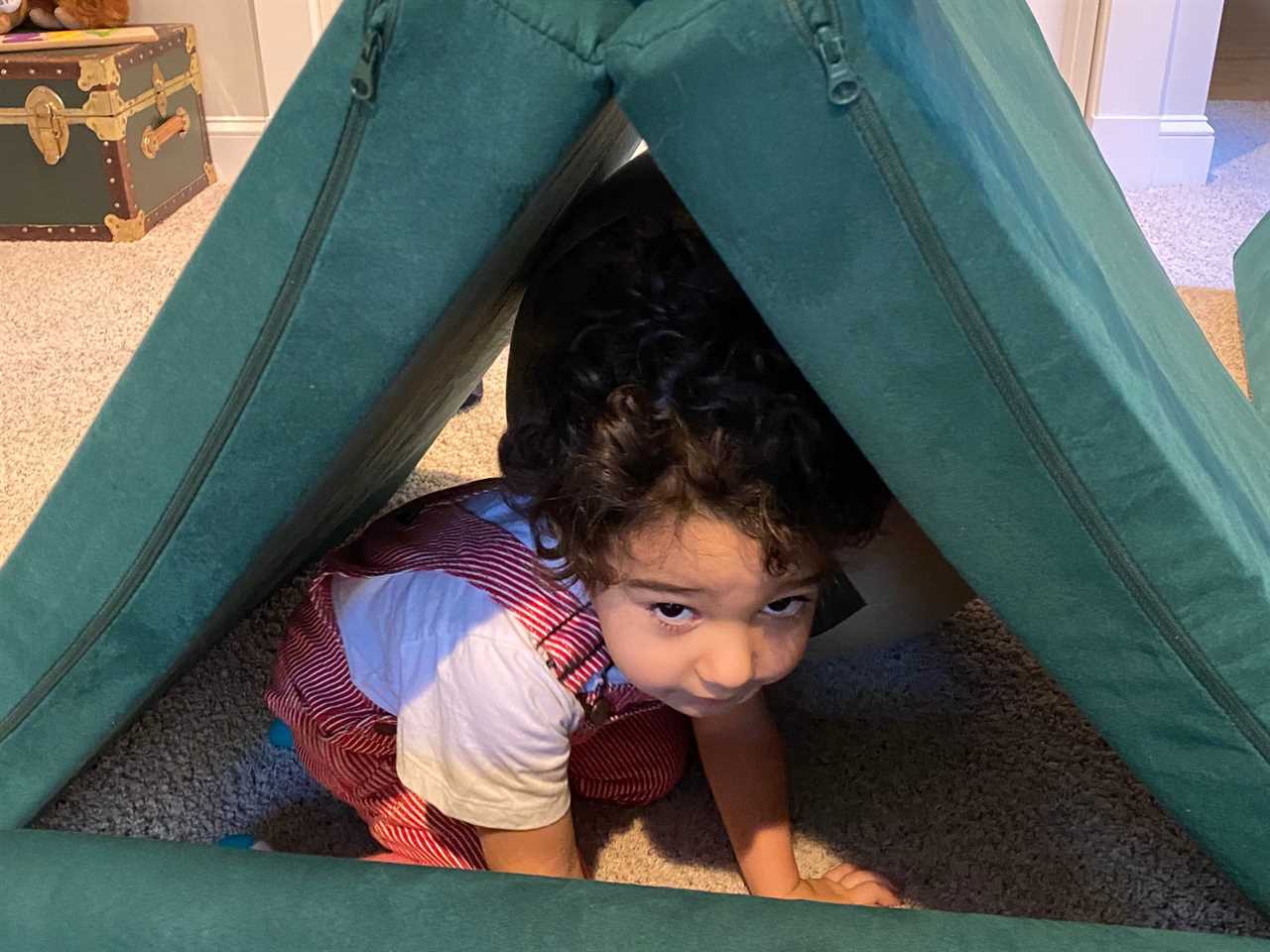 Toddler playing with Nugget