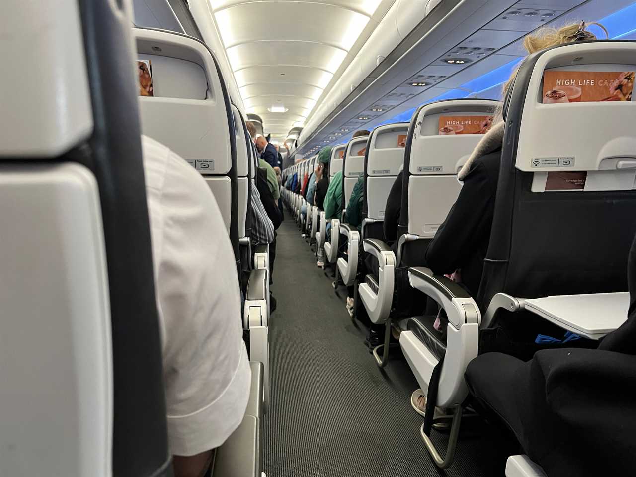 A view of the aisle on a British Airways Airbus A320.