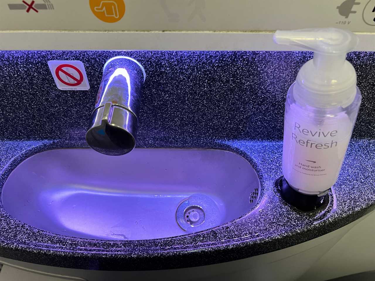 The sink and soap in the bathroom of a British Airways Airbus A320.