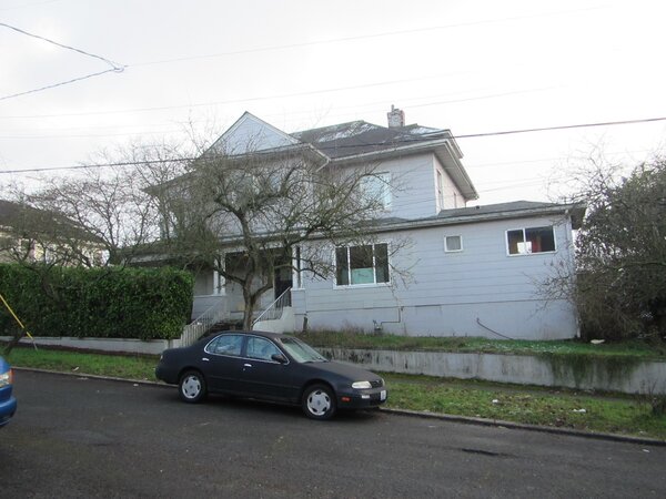 Before: In 2016, Matthew and Holly bought this 1904 home in Seattle, Washington. It had been remodeled and added onto beyond its original size and style in the hundred-plus years since its construction.