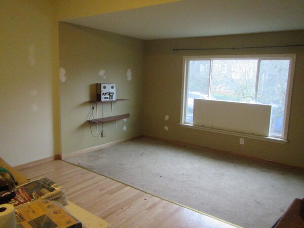 Before: A 1955 addition, denoted by the carpet, boxed in the original bay window.