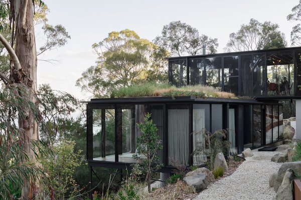 Located in Hobart, Tasmania, Taroona House is a custom home designed by Archier that utilizes the Candor Glazed Structural Timber Facade.