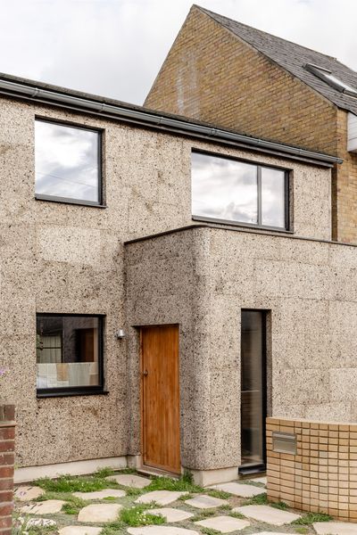 Cork Helps This Renovated Home Blend In Surprising Well With Its London Neighborhood
