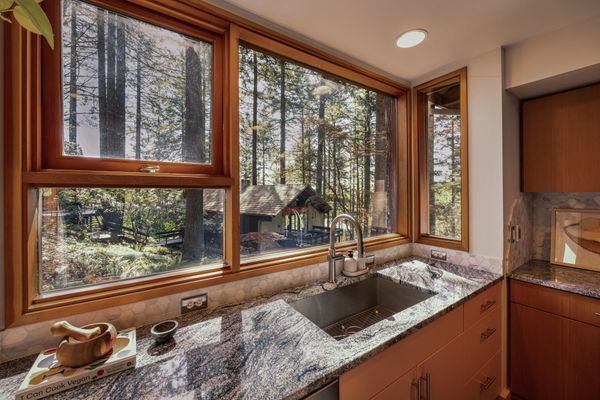 This $1.3M Portland Chalet Cantilevers Over a Wooded Hillside