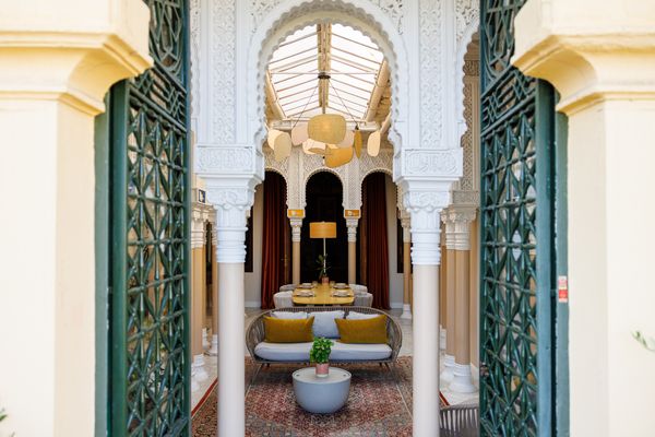 A large indoor patio sits at the heart of the apartment.