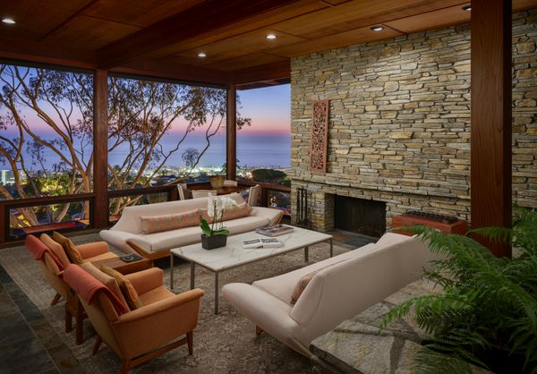 The home is primarily finished with redwood, slate, and mahogany.