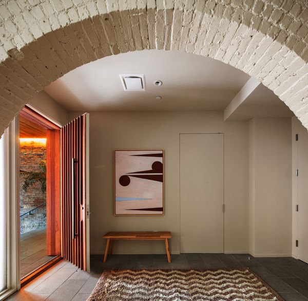 This home has two separate entrances, one of which was originally a horse and buggy loading dock.