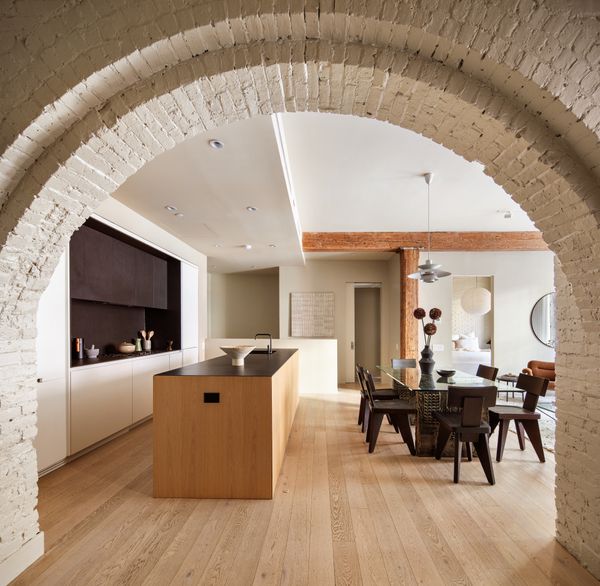 The kitchen is custom-made from the Italian brand RiFRA.
