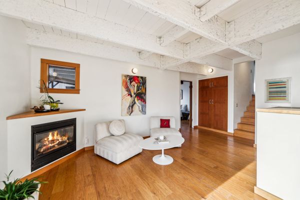A gas fireplace heats the living and dining room.