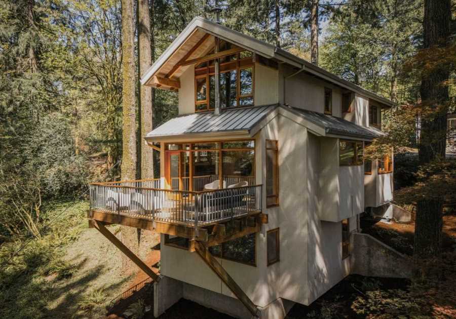 This $1.3M Portland Chalet Cantilevers Over a Wooded Hillside
