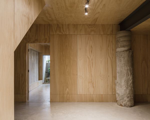 The plywood is separated into three different panels vertically. There’s one large chunk in the middle and a shorter chunk on each side, like baseboards and crown molding.