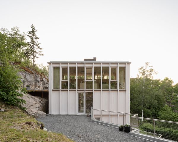 Why Does This Swedish Home Look So Crisp? The Wood Cladding Doesn’t Have Any Knots