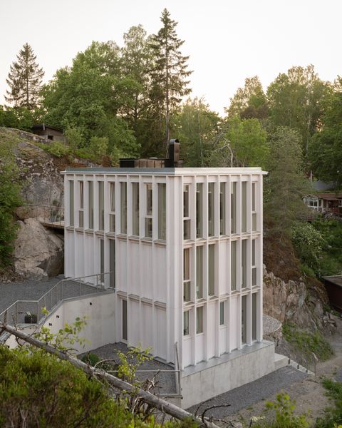Why Does This Swedish Home Look So Crisp? The Wood Cladding Doesn’t Have Any Knots