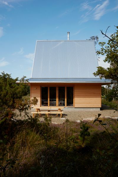 This 605-Square-Foot Swedish Cabin Looks Like It’s Wearing a Witch’s Hat
