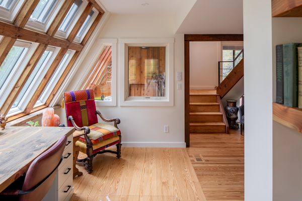 The greenhouse windows flood the space with natural light.