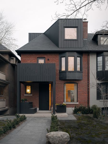When Studio Vaaro set about to renovate this house in Toronto's Rathnelly neighborhood, they had to dig deep (literally) in order to expand the space while maintaining the facade.