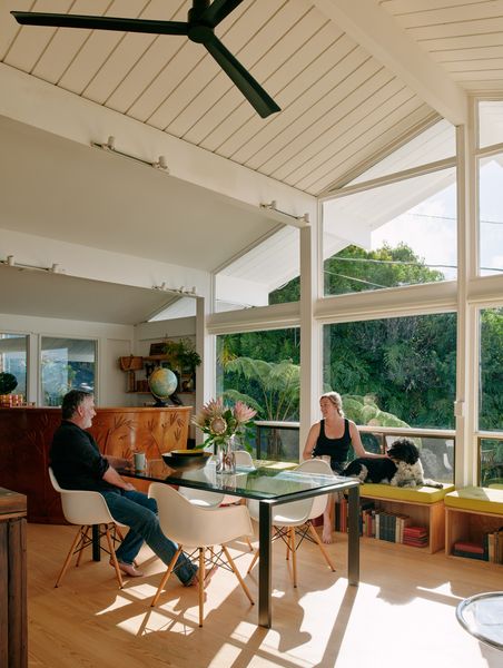 The renovated home takes advantage of its vaulted ceiling and newly open plan to create one big inviting space for Brandon, Katy, Scout and the kids.