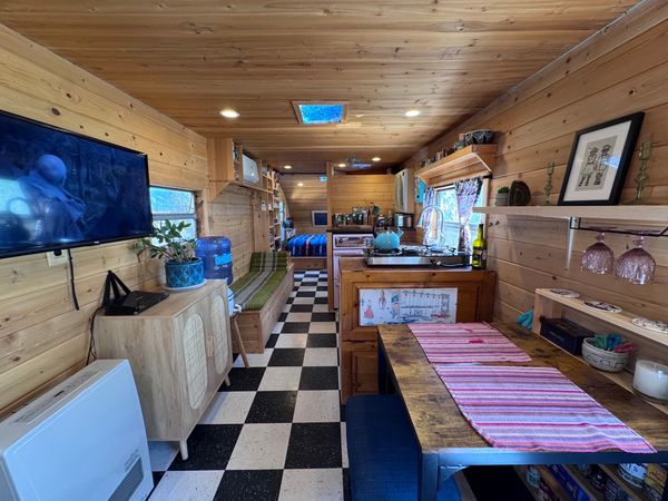 Tongue and groove knotty pine lines the walls and ceiling.