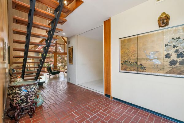 The Roof of This $775K Memphis Midcentury Curves All the Way to the Ground