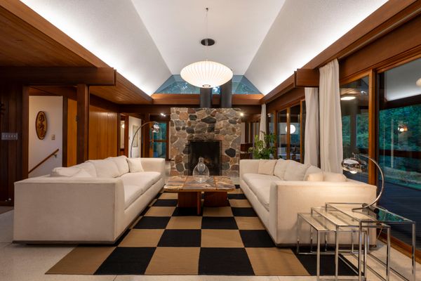 Redwood Beams Meet Walls of Glass in This $1.2M Minneapolis Midcentury