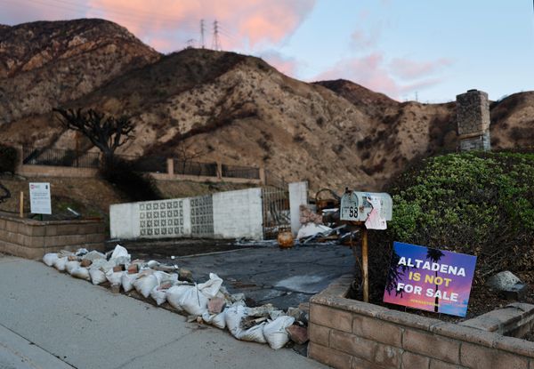 ALTADENA, CALIFORNIA - MARCH 11: A sign reading "Altadena Is Not For Sale!
