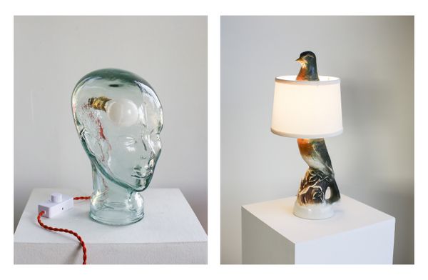 If you put your mind to it, really, anything can be a lamp! See: a glass head and a statue of a pigeon.