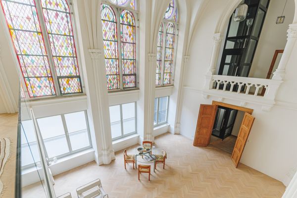 Heavenly Light Pours Through Stained Glass in This $1.7M Converted Convent in Antwerp