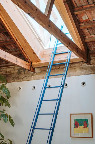 Knocking Out Partitions and a Drop Ceiling Loft-ified This ’60s Spanish Home