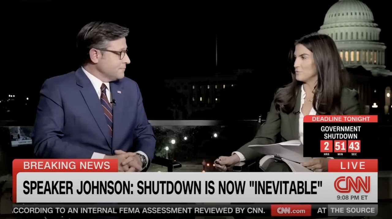 News anchors discuss the imminent government shutdown on CNN, with the U.S. Capitol in the background and a countdown timer displayed.