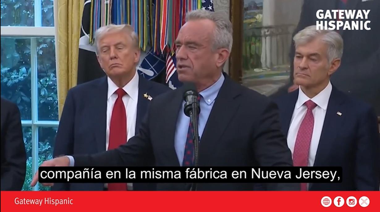 Robert F. Kennedy Jr. speaks at a press event in the White House, flanked by Donald Trump and another official, discussing a company in New Jersey.