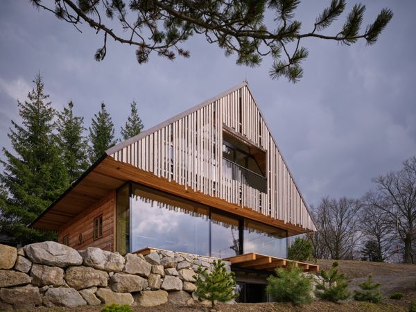 One Side of This Czech Home Feels Like a Traditional Log Cabin—the Other Has Lots of Glass