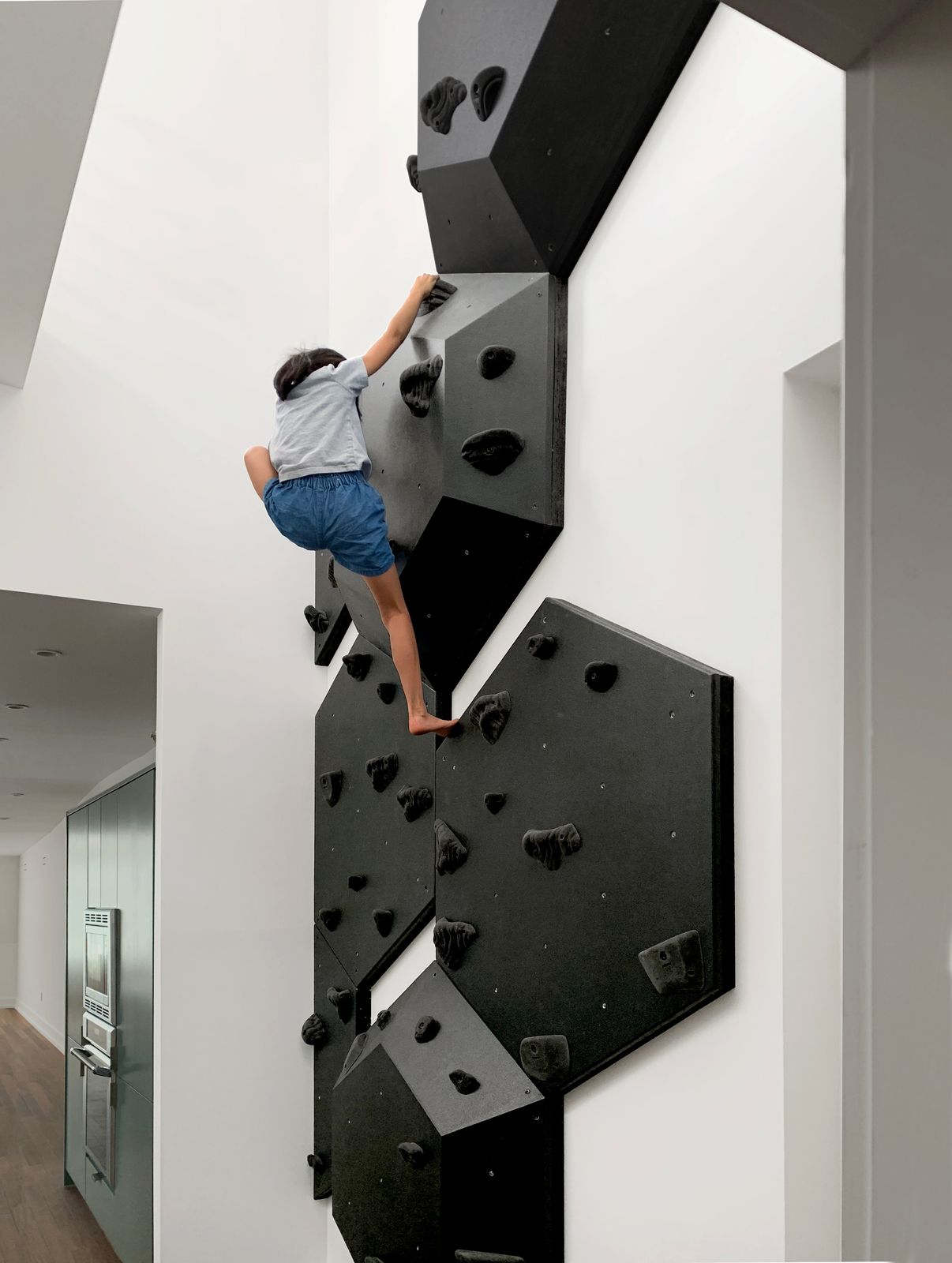 How They Pulled It Off: A Sophisticated But Kid-Friendly Climbing Wall