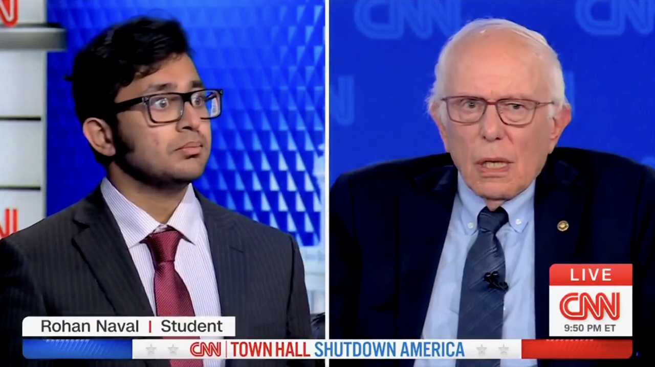 Rohan Naval, a student, engages in a discussion with Senator Bernie Sanders during a CNN town hall event.