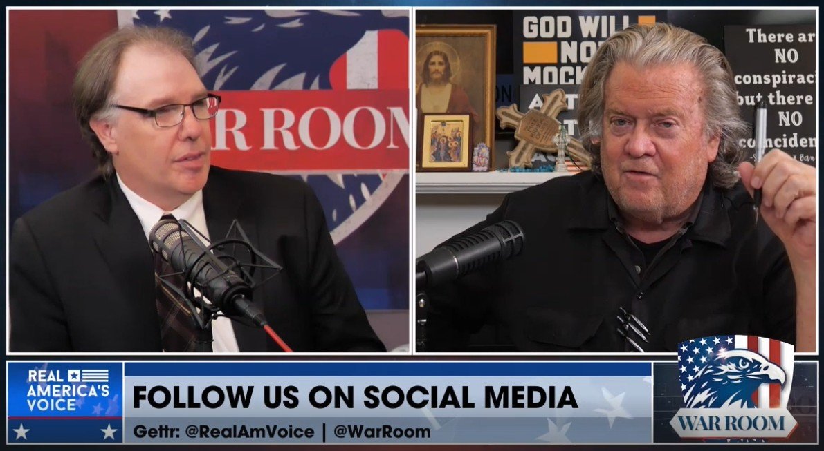 Two men discussing on a podcast set, featuring microphones and various decorations, emphasizing social media engagement for the show "War Room."