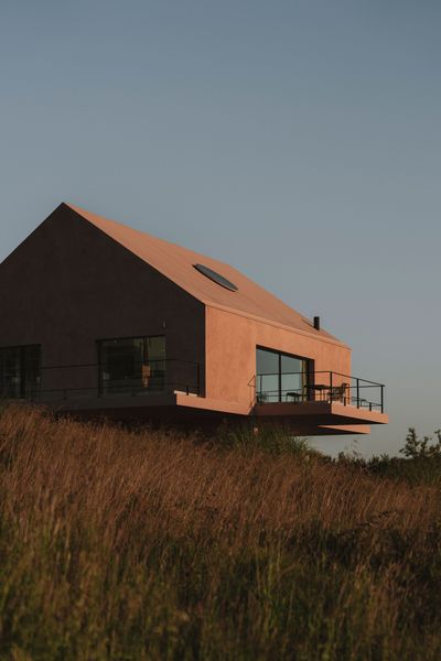 Every Side of This Pink House in Portugal Has a Patio