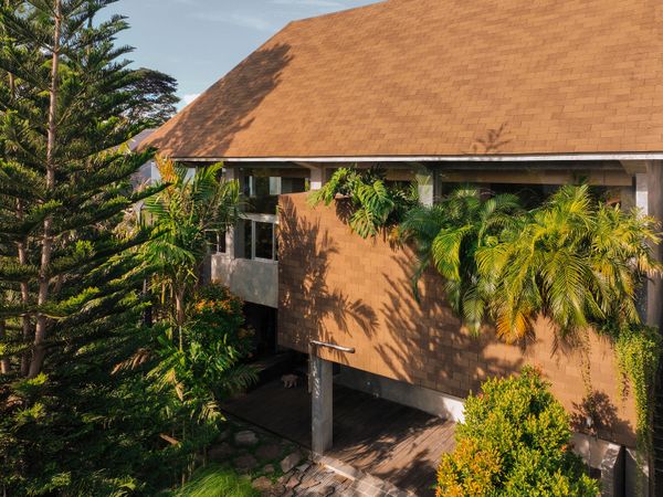 The Roof of This Indonesian Home Hides an Impressively Roomy Primary Suite