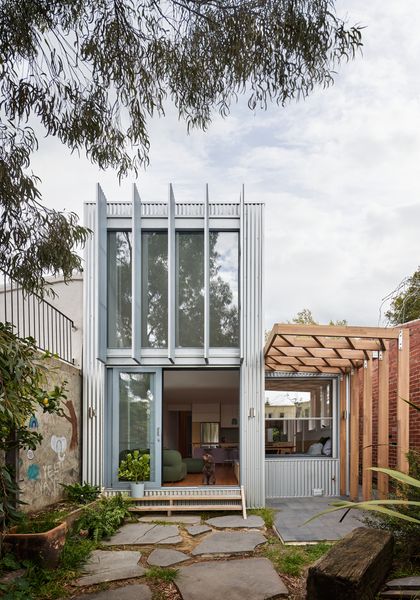 You’d Never Guess This Quiet-Looking Australian Home Has a Soaring Living Space