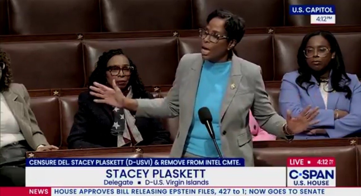 Stacey Plaskett speaking passionately in the U.S. House of Representatives, addressing a censure motion while fellow delegates listen attentively.