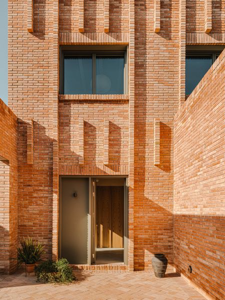 Flexibility Is at the Forefront of This Brick Home in Barcelona