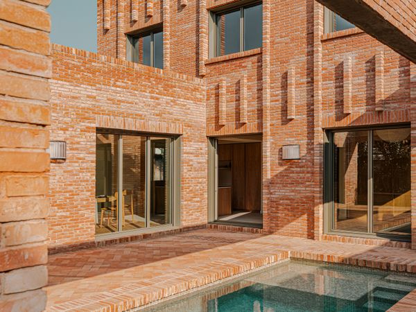 Flexibility Is at the Forefront of This Brick Home in Barcelona