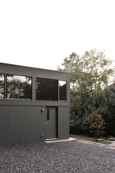 The Garage Was in Bad Shape, So She Swapped It Out for a Crisp Art Studio