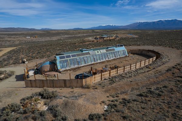 This self-sufficient Earthship is currently listed for $635K. The house is 2,000-square-feet with 3 bedrooms and 2 bathrooms.