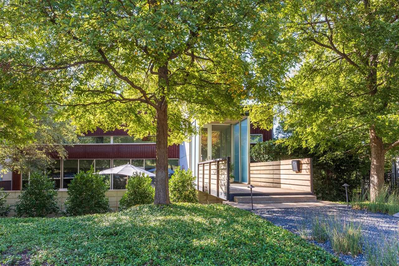 Cross the Bridge to Enter This $1.4M Dallas Home Wrapped in Cor-Ten Steel