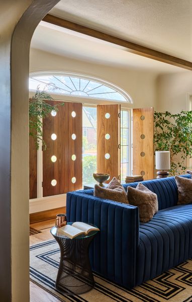 The 300-square foot living room is located on the main floor and overlooks the front yard; it opens up directly to the entryway and into the dining room.