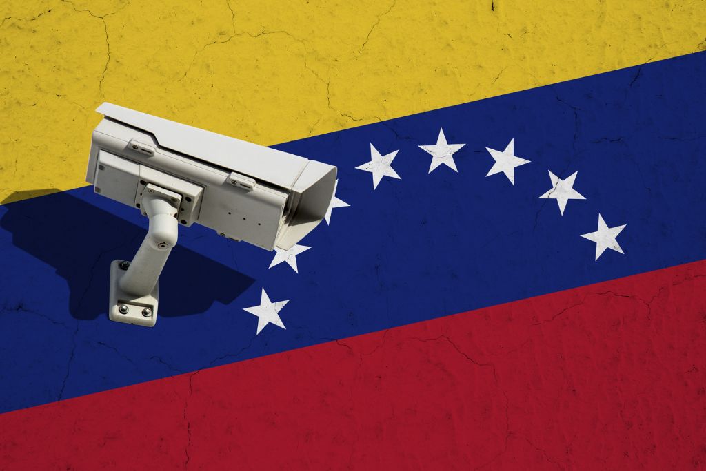 Surveillance camera mounted on the Venezuelan flag, symbolizing security and monitoring in Venezuela.