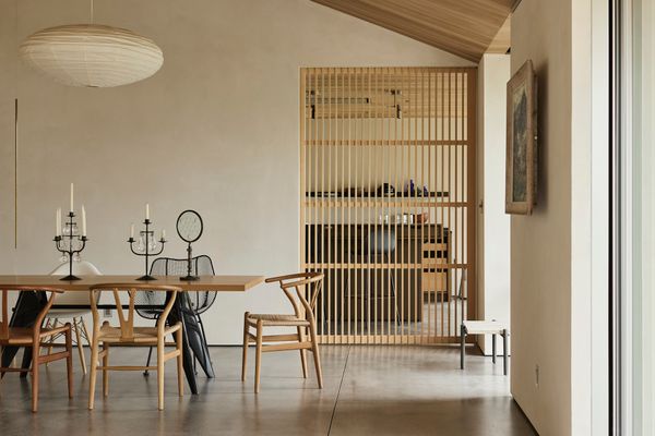The yellow cedar pocket doors separating the kitchen from the living area were crafted by Brian Holcombe.