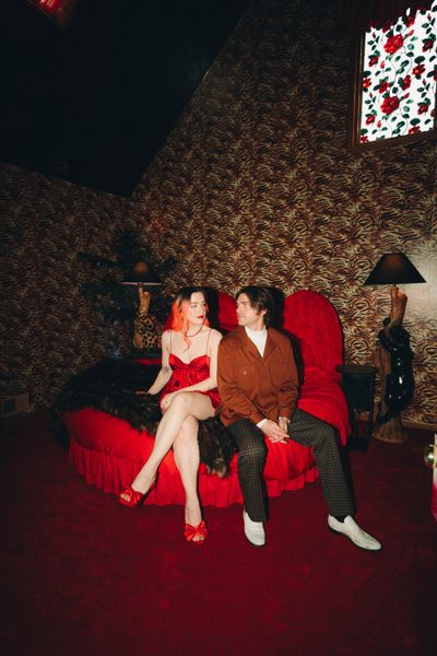 Couple Margaret and Cory Bienert as seen in one of the bedrooms in the house they’ve spent few years turning into their dream home—and hotel.