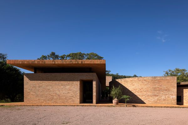 The Roof of This Brazilian Home Takes a Dip in the Pool