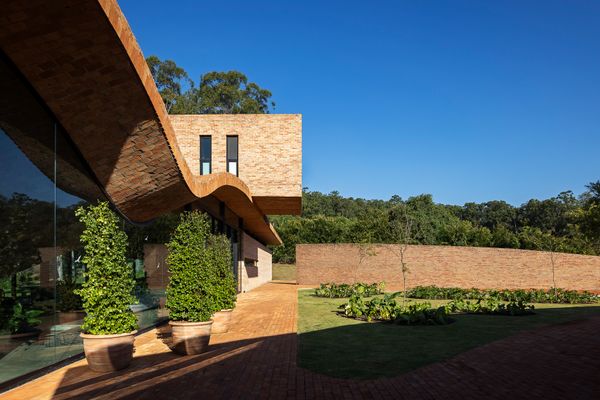 The Roof of This Brazilian Home Takes a Dip in the Pool