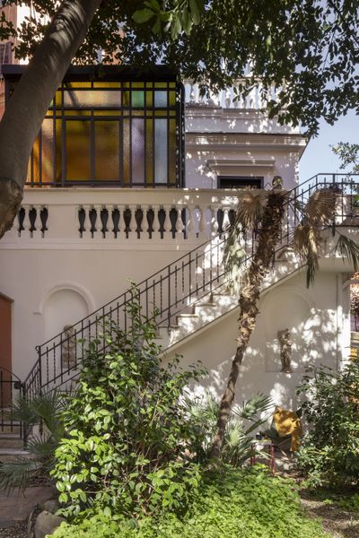 A Glass-Floor Mezzanine Shatters Conventions in This Reworked Rome Apartment